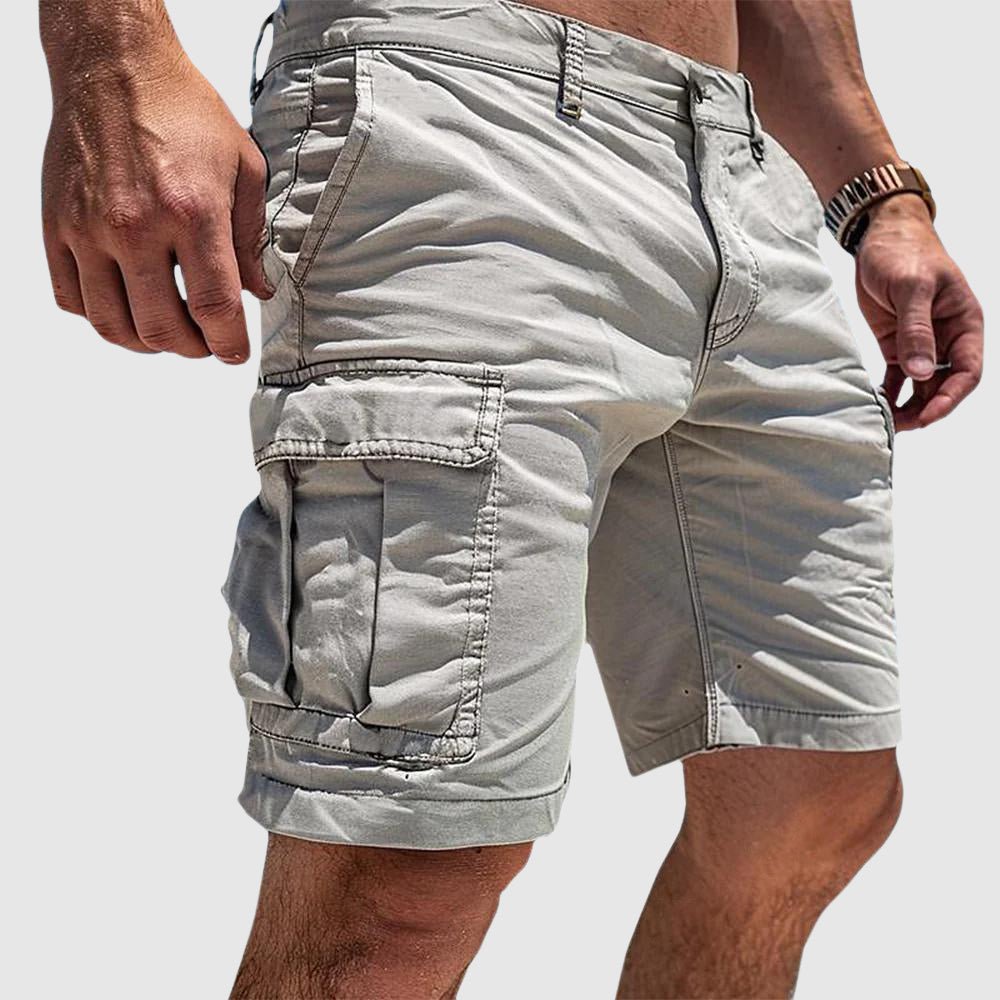 Men's knee-length cargo shorts, perfect for casual wear, featuring multiple secure flap pockets for utility and convenience.