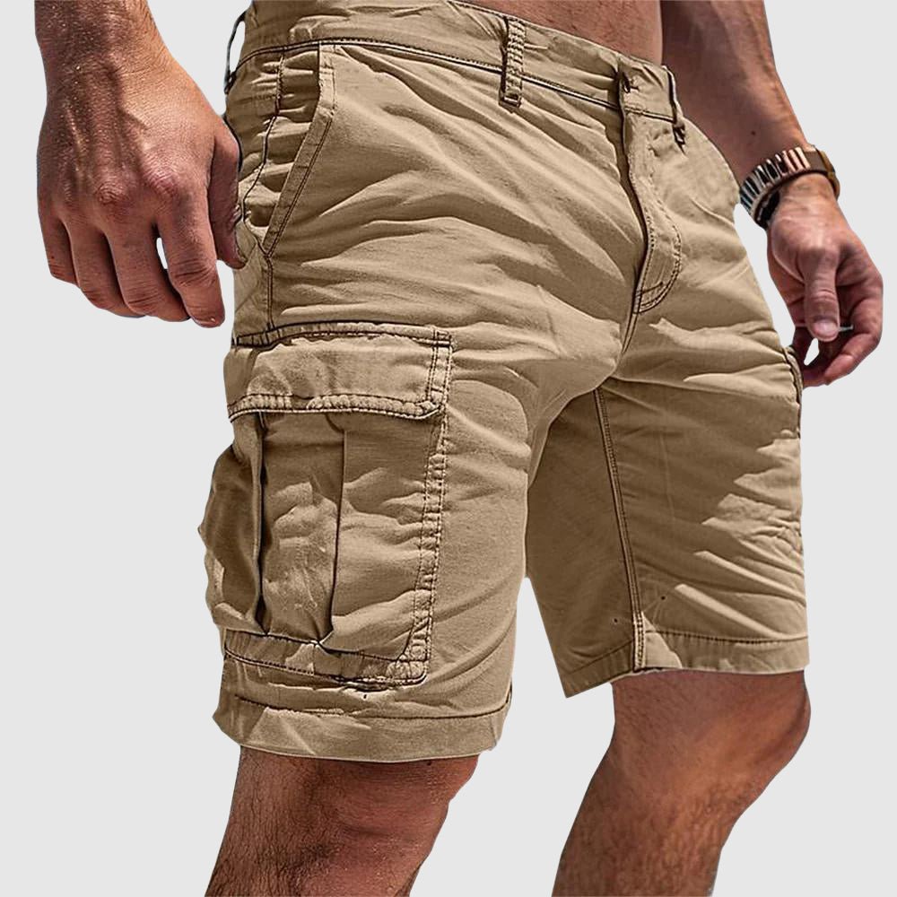 Stylish men's knee-length utility cargo shorts, designed with multiple secure flap pockets for practicality and summer wear.