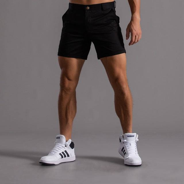 Versatile men's chino shorts, knee-length, great for golf, casual outings, and warm weather activities.