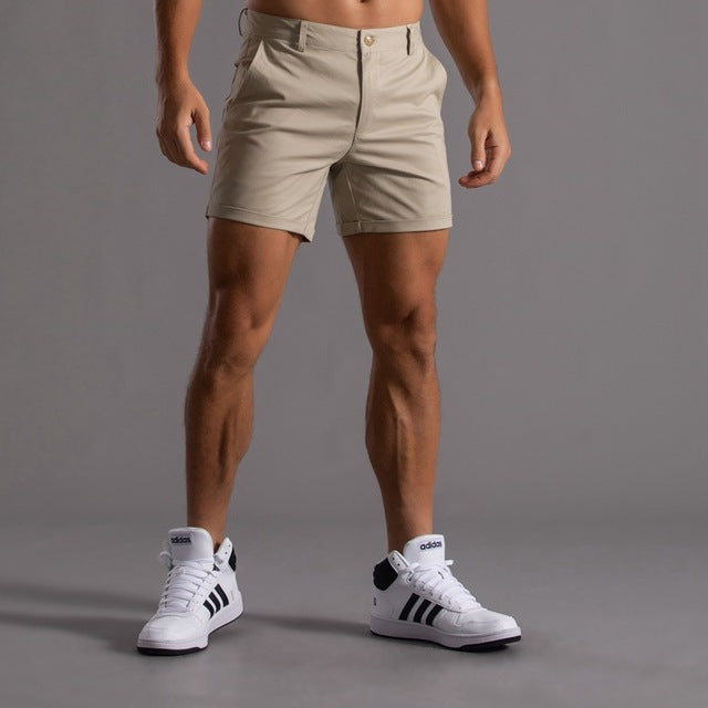Back view of men's knee-length chino shorts, showing pocket details and comfortable fit for warm weather.