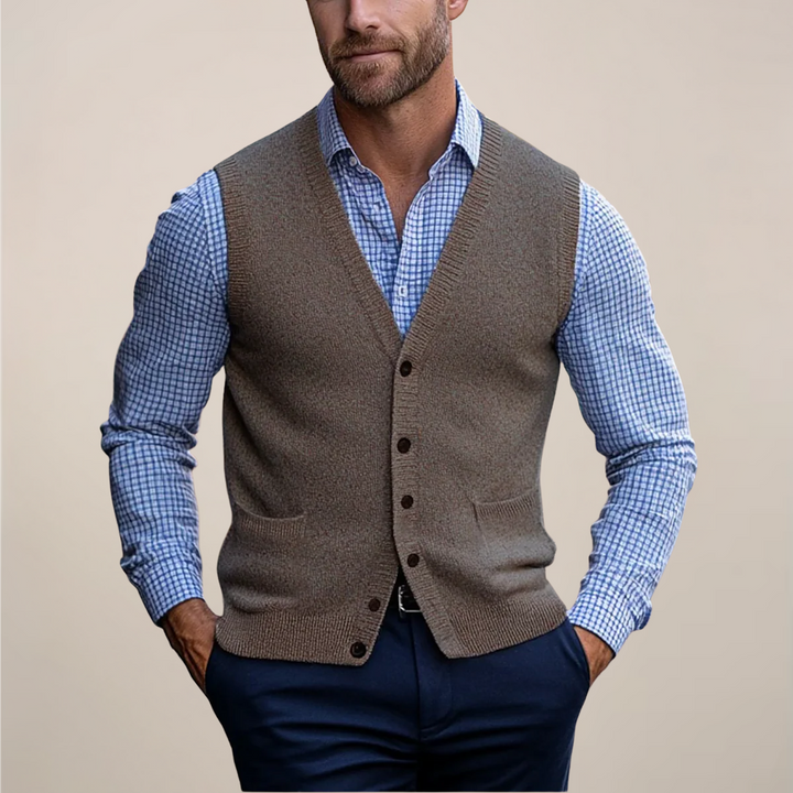 Men's knit sleeveless sweater vest with ribbed design, a lightweight and comfortable layering piece for all seasons.