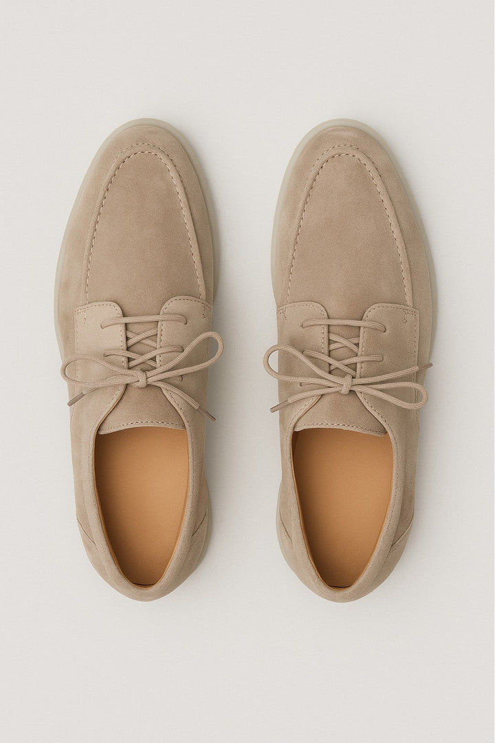 Stylish men's lace-up moccasin loafers, ideal for everyday wear, offering comfort and a versatile smart casual look.