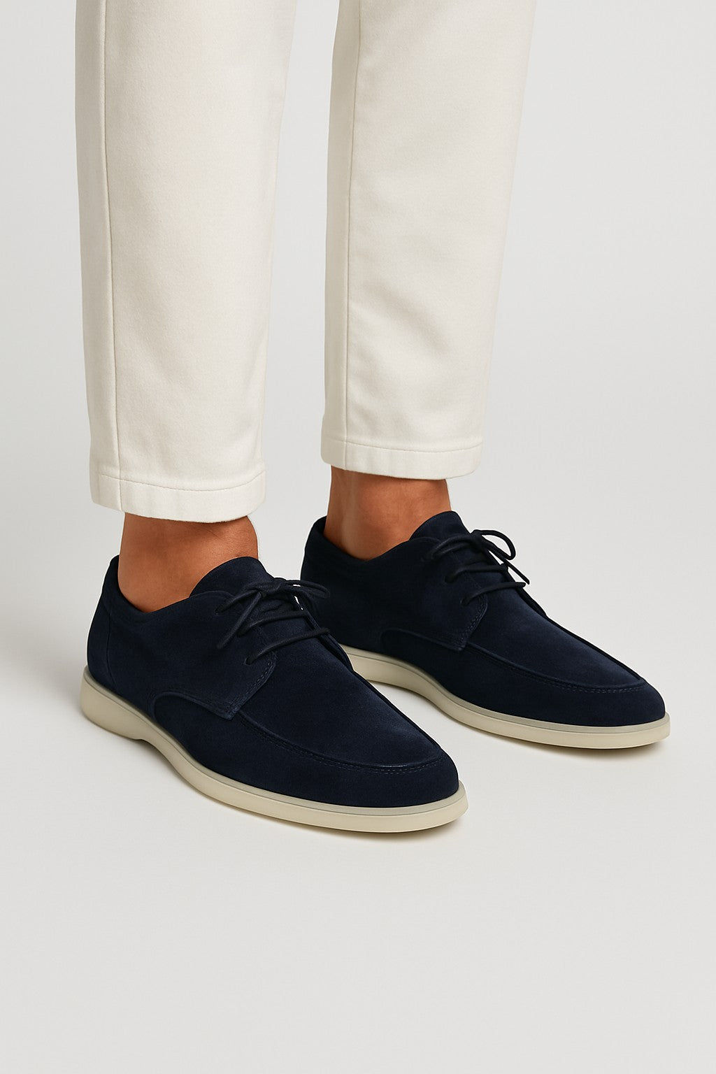 Classic men's lace-up moccasin loafers with a flexible sole, offering timeless style and comfort for everyday wear.