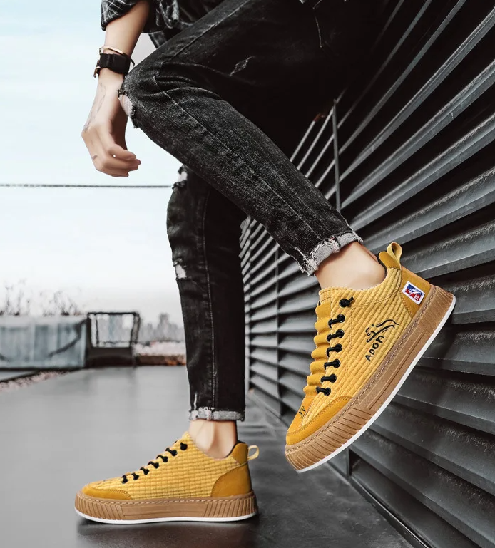 Men's comfortable lace-up quilted low top sneakers with non-slip platform sole for stylish everyday wear.
