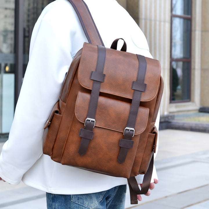 Durable men's oxford style commuter bag, a large capacity travel backpack with laptop compartment.