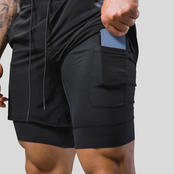Men's layered running shorts with a secure zip pocket. Performance activewear for training & gym.