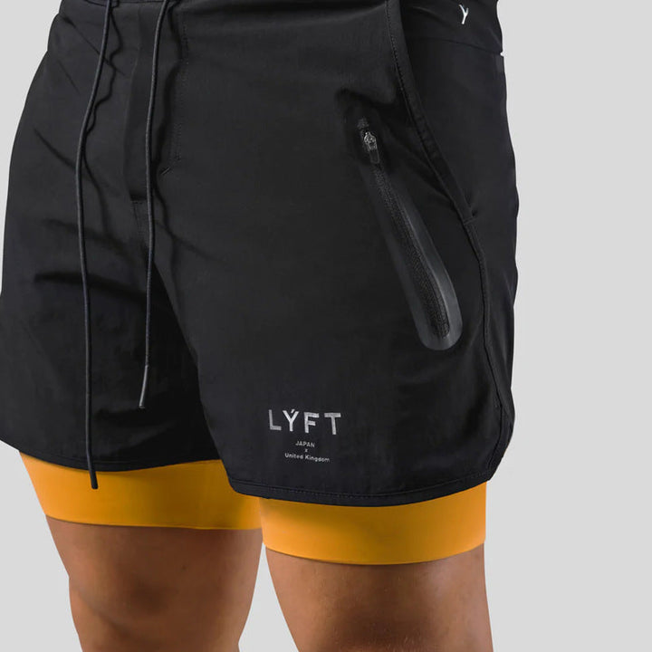 Men's running & workout shorts, layered design, featuring a convenient zip pocket for essentials.