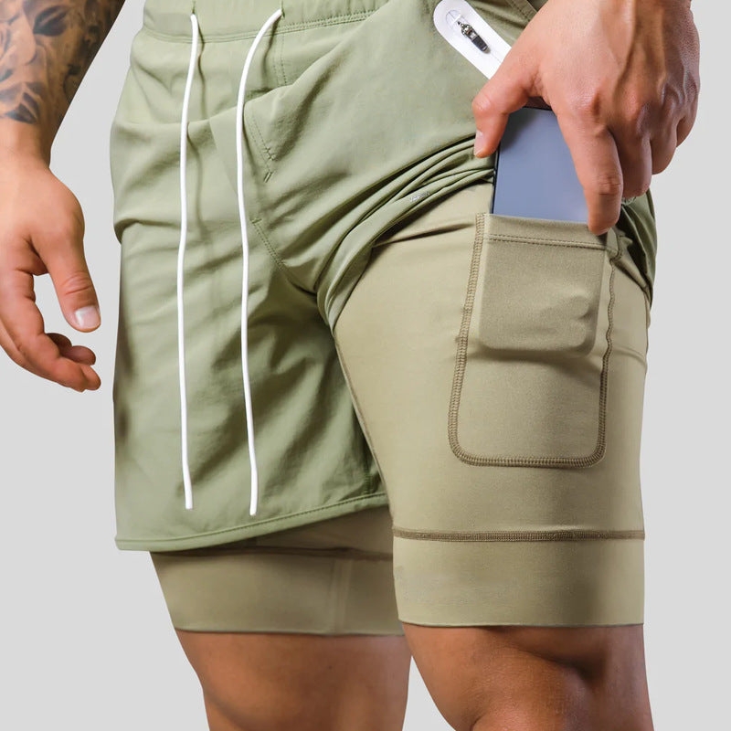Durable men's gym shorts, layered design, featuring a functional zip pocket for security during training.