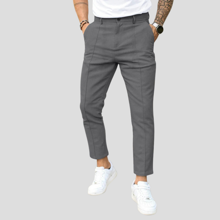Straight-leg men's leisure pants with a comfortable elastic waist. Versatile for casual, office, or weekend wear.