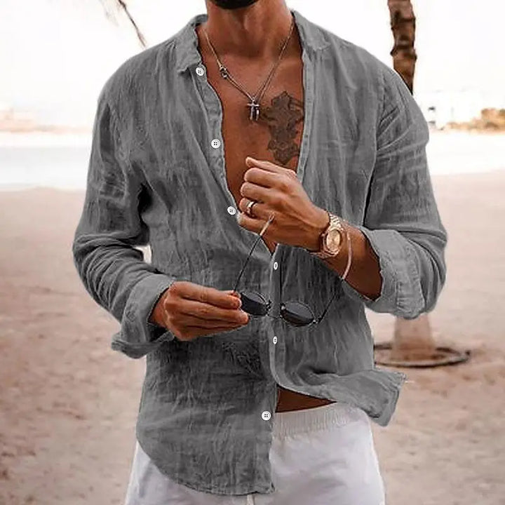 Men's navy blue button-front long sleeve shirt, relaxed fit, perfect for summer beach comfort.