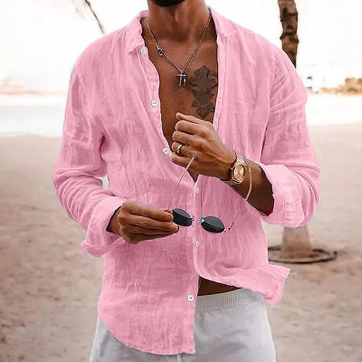 Men's light blue casual long sleeve shirt, relaxed fit button-front, ideal summer beachwear.