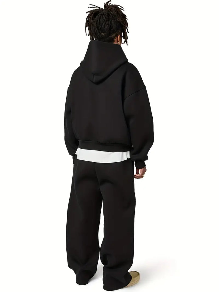 Light grey men's oversized casual tracksuit set, blending comfort & contemporary men's fashion.