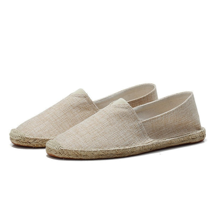 White men's casual espadrille loafers. Hemp slip-on shoes designed for breathable comfort on summer vacations.