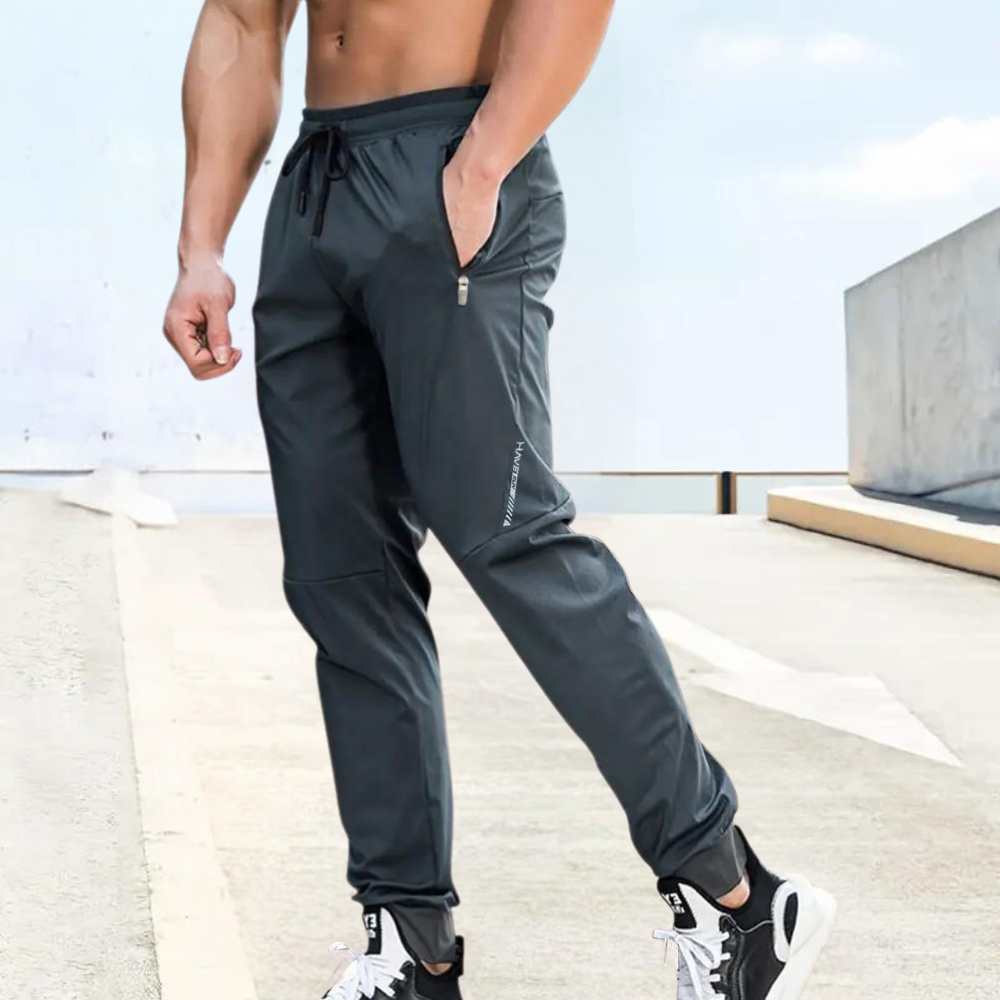 Breathable men's activewear trousers, ideal for sports, training, & casual comfort.