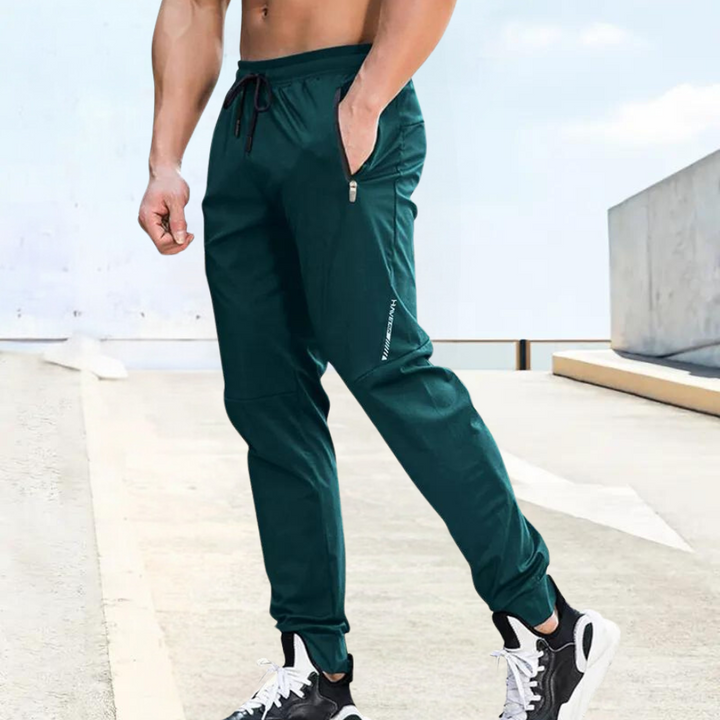 Men's performance running trousers, lightweight & breathable for optimal athletic training.