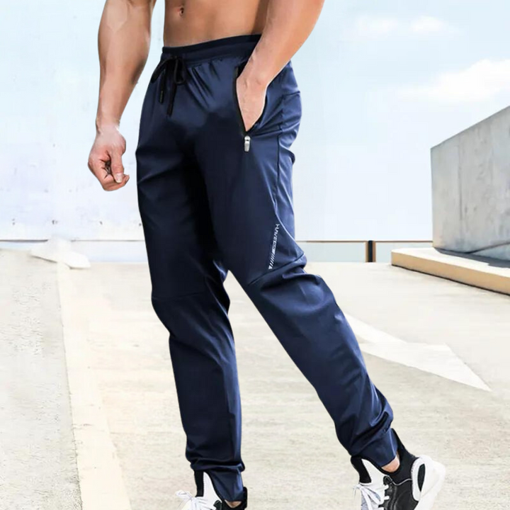 Versatile men's sports trousers; lightweight, breathable activewear for gym, running, or casual wear.
