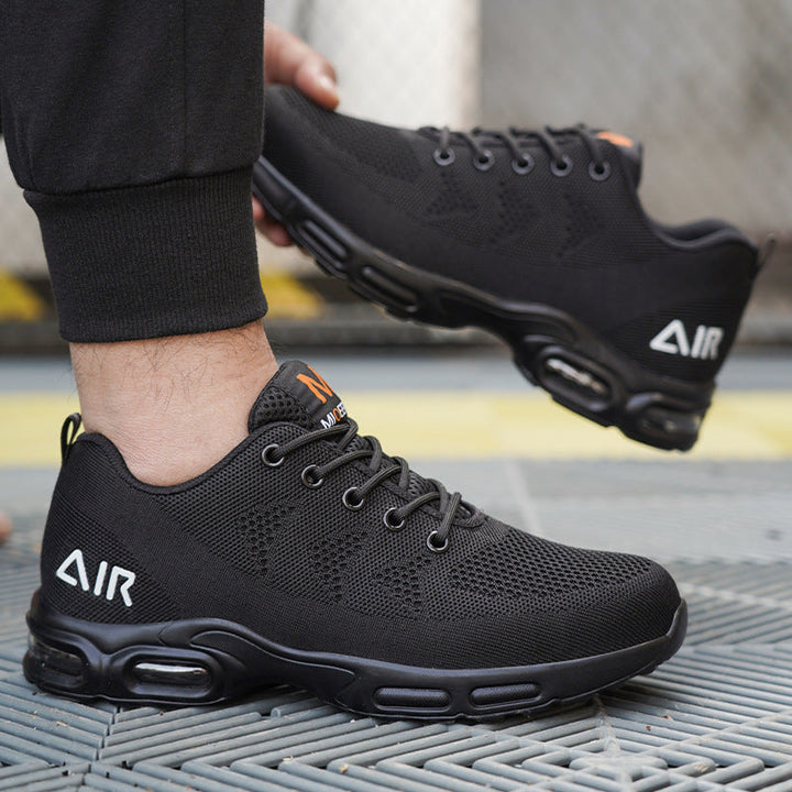 New lightweight men's black safety shoes, water-resistant & comfortable with steel toe. Perfect for industrial work.