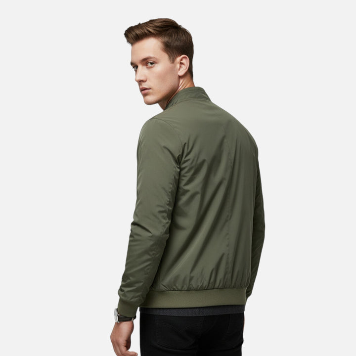 Stylish men's lightweight bomber jacket. Features a classic ribbed collar and zip-up front for versatile layering.