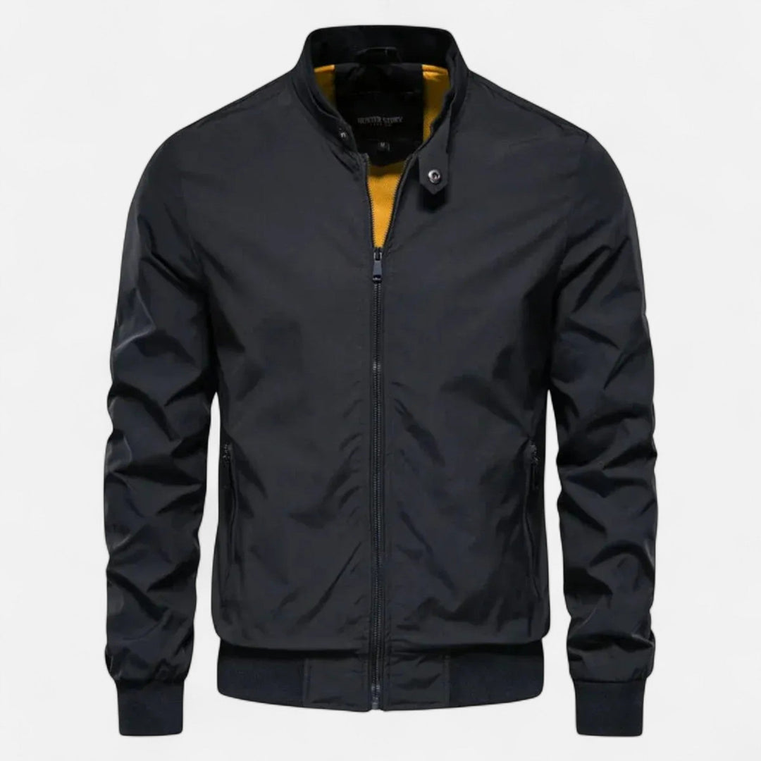 Comfortable men's lightweight bomber jacket. Boasts a classic ribbed collar and a sleek, modern design for everyday wear.