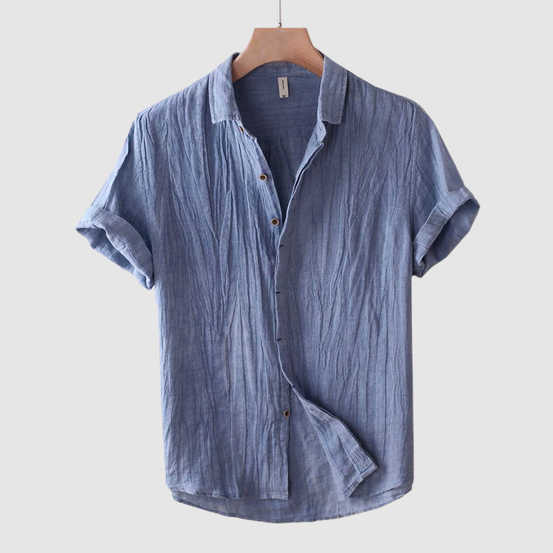 Men's lightweight breathable short sleeve button-down shirt, perfect for casual summer fashion or resort wear.