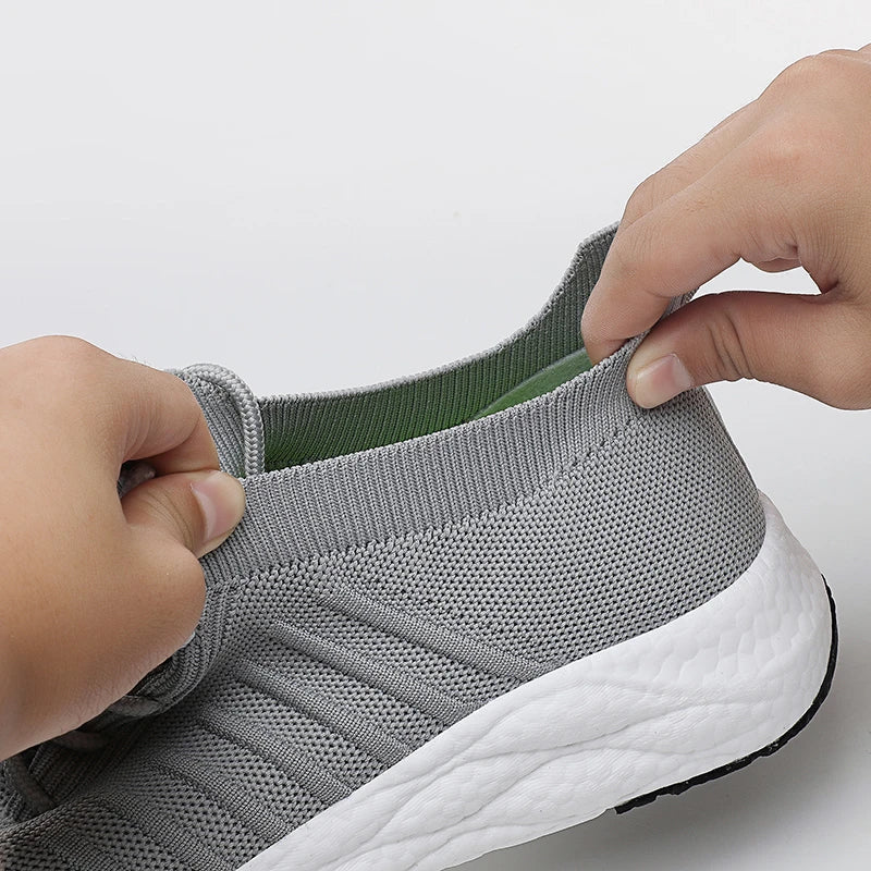 Breathable men's trainers, lightweight and comfortable for sport, running, and everyday casual activities.