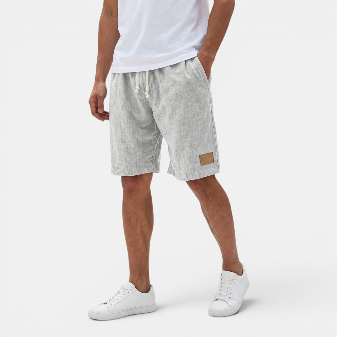 Casual men's activewear shorts. Lightweight drawstring for beach, travel, & summer comfort.
