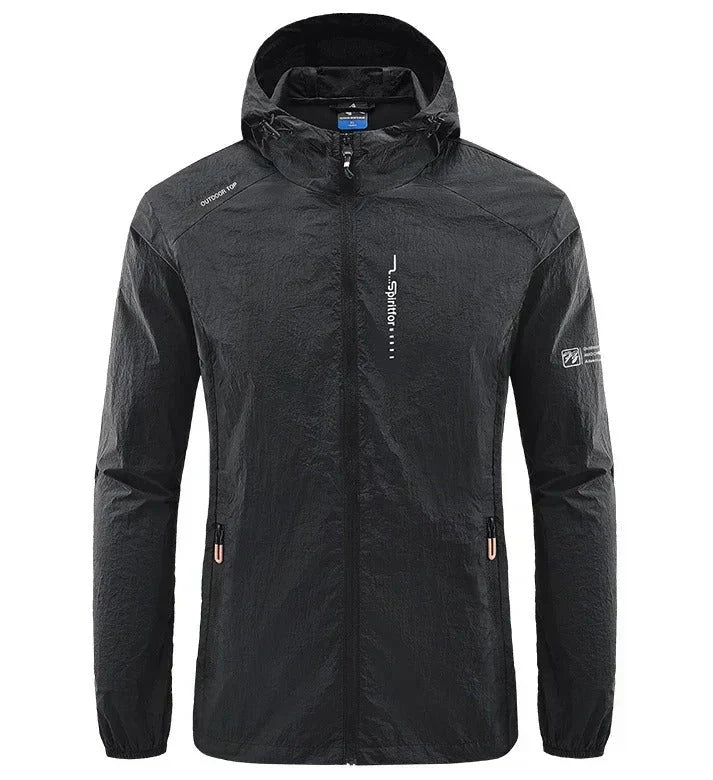 Versatile men's hooded travel jacket, ultra-light and breathable, offering wind & sun protection for summer.