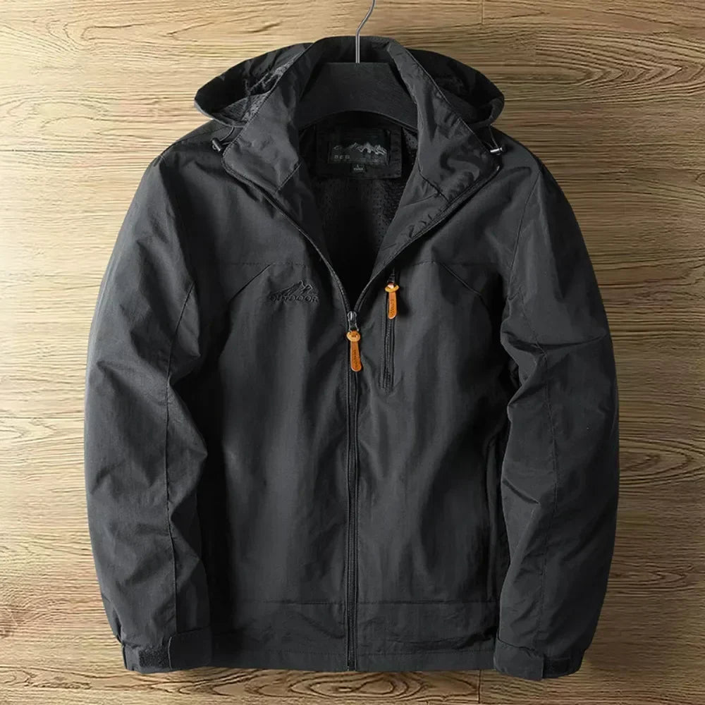Men's lightweight hooded waterproof rain jacket for outdoor activities. Ideal for hiking, travel, and casual wear.