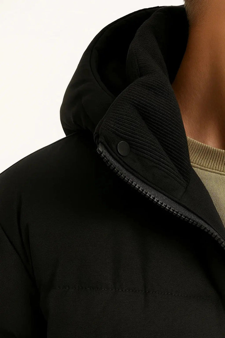 Warm men's hooded puffer jacket with practical zip pockets, perfect for casual fall & winter wear.