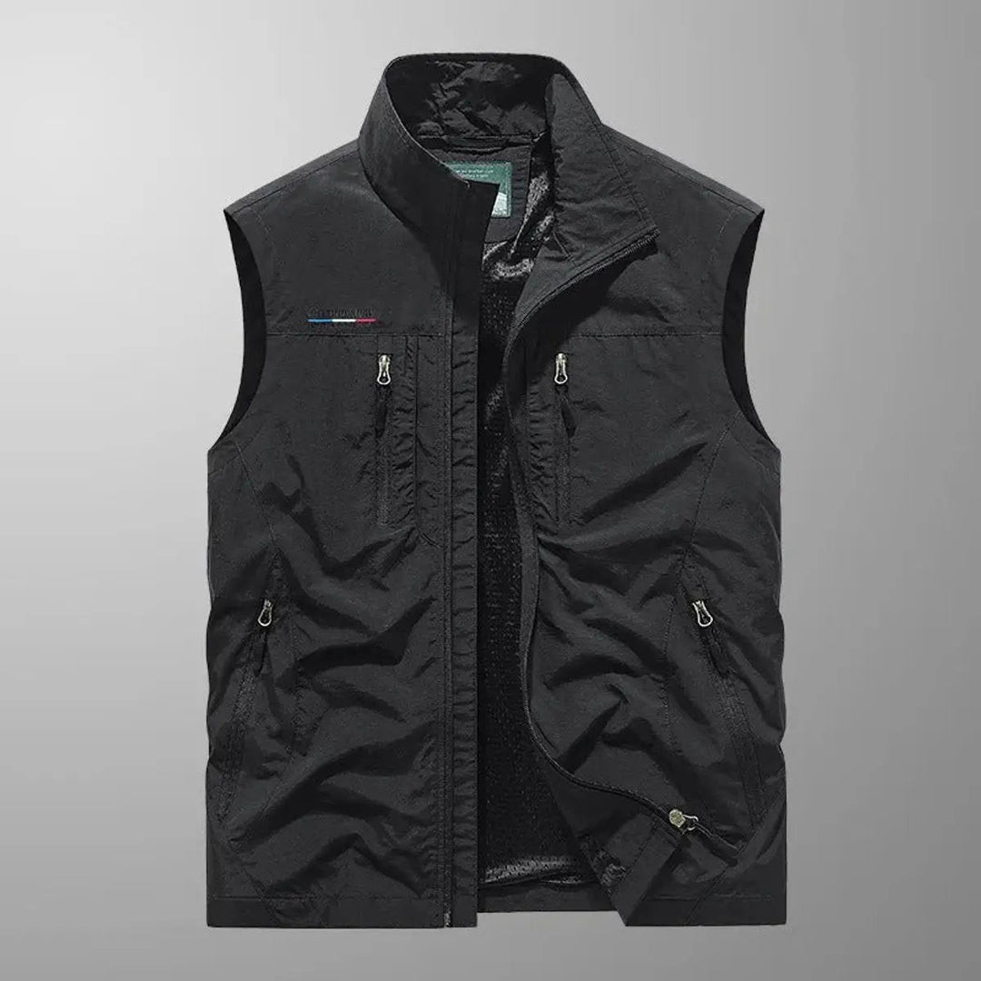 Durable men's water-resistant multi-pocket gilet vest with zip-up front, ideal for hiking & travel.
