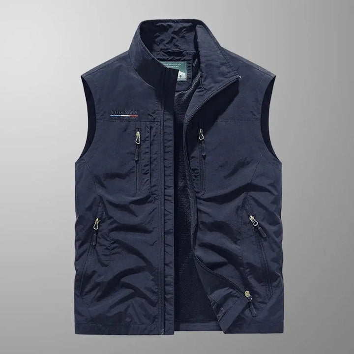 Versatile men's zip-up gilet vest, water-resistant with multiple pockets for outdoor adventure & travel.