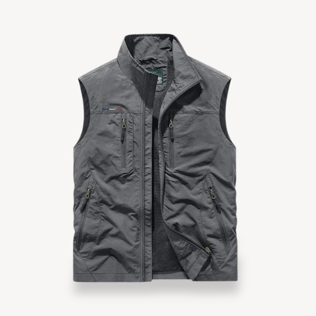 Sleeveless men's utility vest with ample pockets, perfect for fishing, hiking, and outdoor travel.