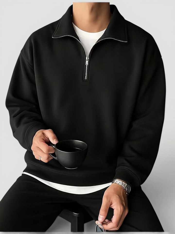 Comfortable men's quarter zip pullover. Soft, long-sleeve sweater perfect for everyday wear and casual style.