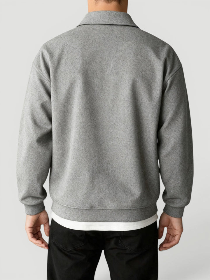Modern men's quarter zip pullover. Lightweight, comfortable sweater for casual or smart casual occasions.