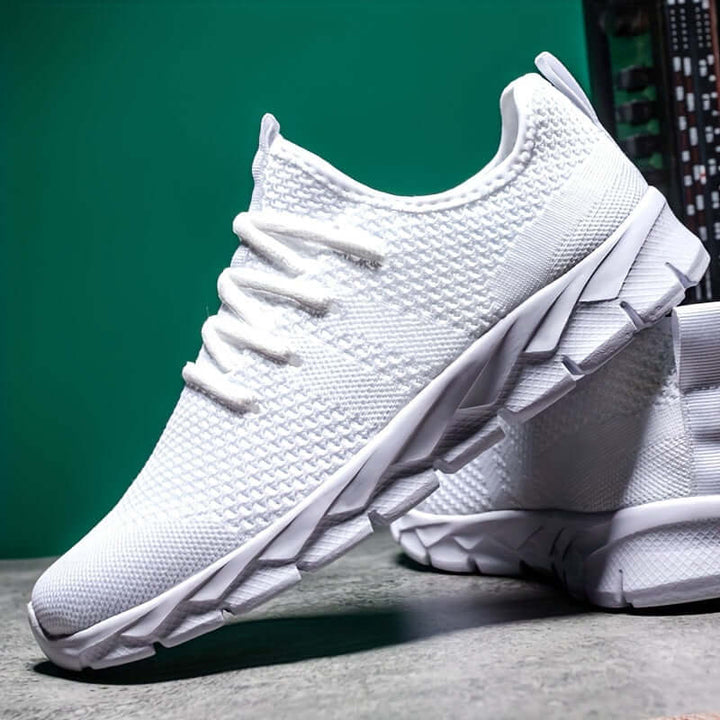 Men's running shoes featuring a durable, non-slip sole for secure athletic performance & long-lasting wear.