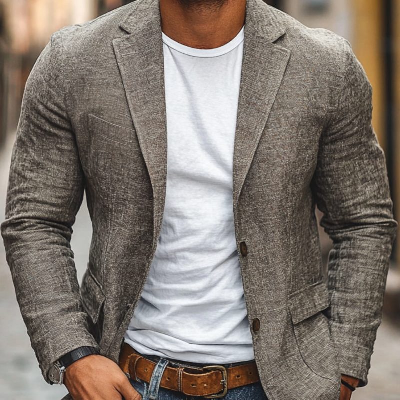 Model in men's lightweight single-breasted blazer jacket, showcasing a modern smart-casual fashion look.