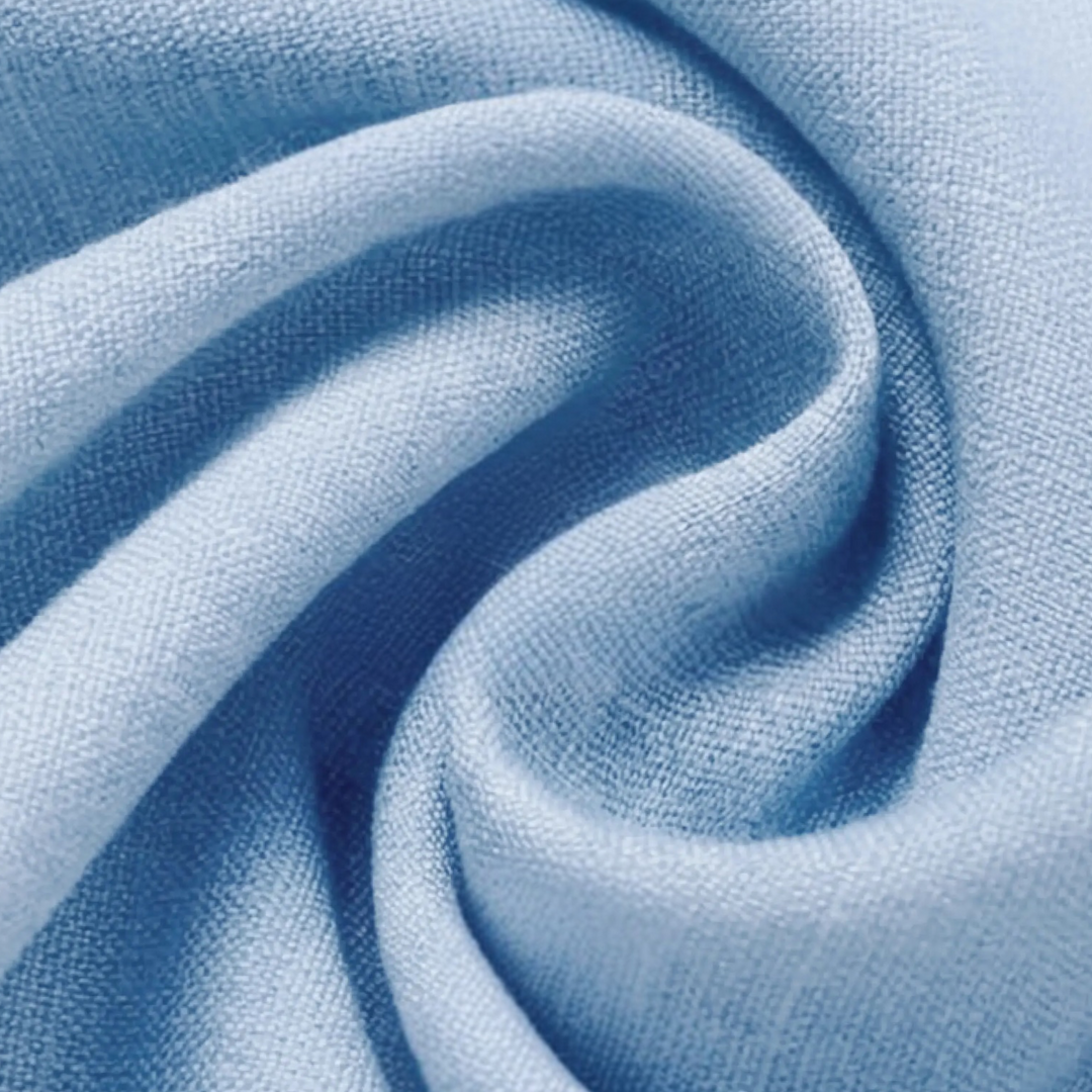 Close-up of men's lightweight summer shirt fabric, showing texture and quality, short sleeve design.