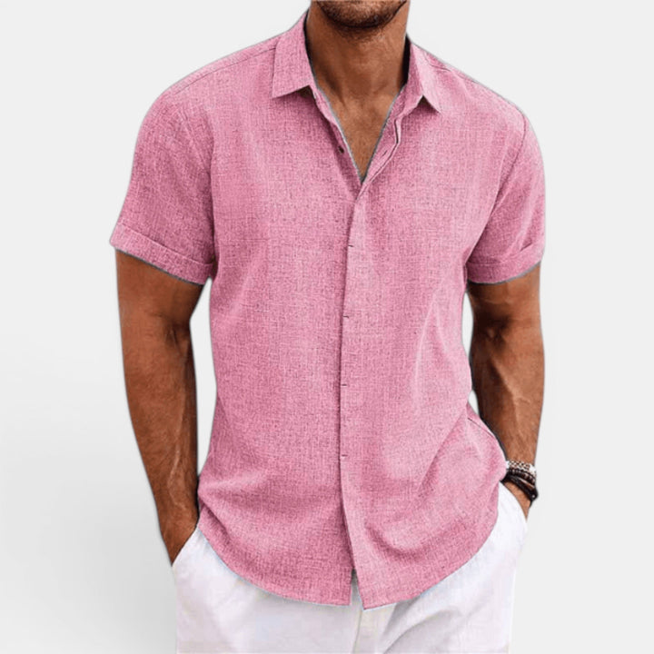 Men's lightweight short sleeve shirt paired with chinos, perfect summer casual or smart casual attire.
