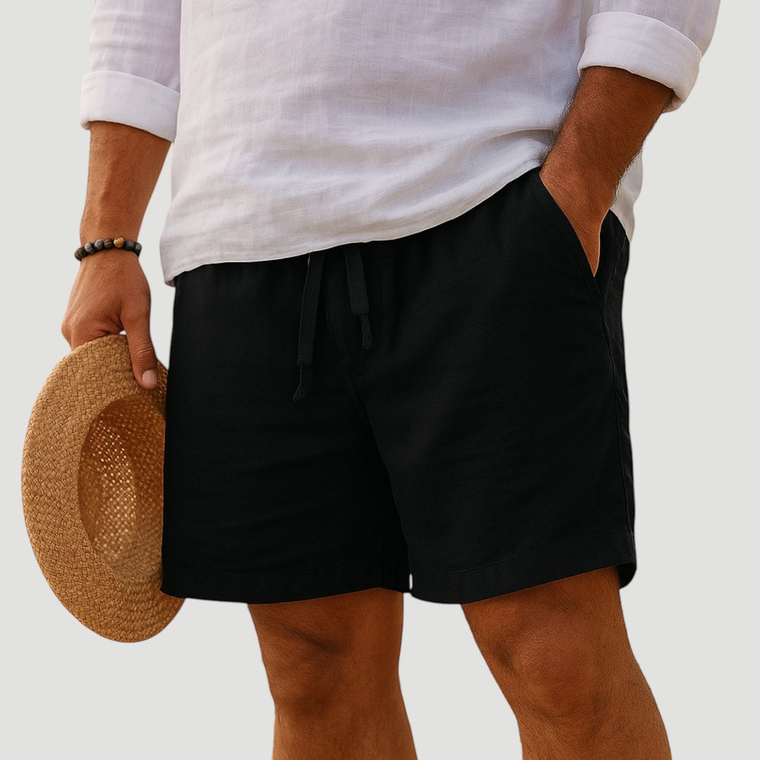 Man wearing versatile lightweight summer shorts, perfect for casual activities & warm weather comfort and style.