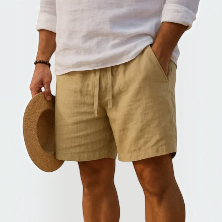 Back view of men's lightweight summer shorts, featuring practical pockets for versatile warm weather comfort.