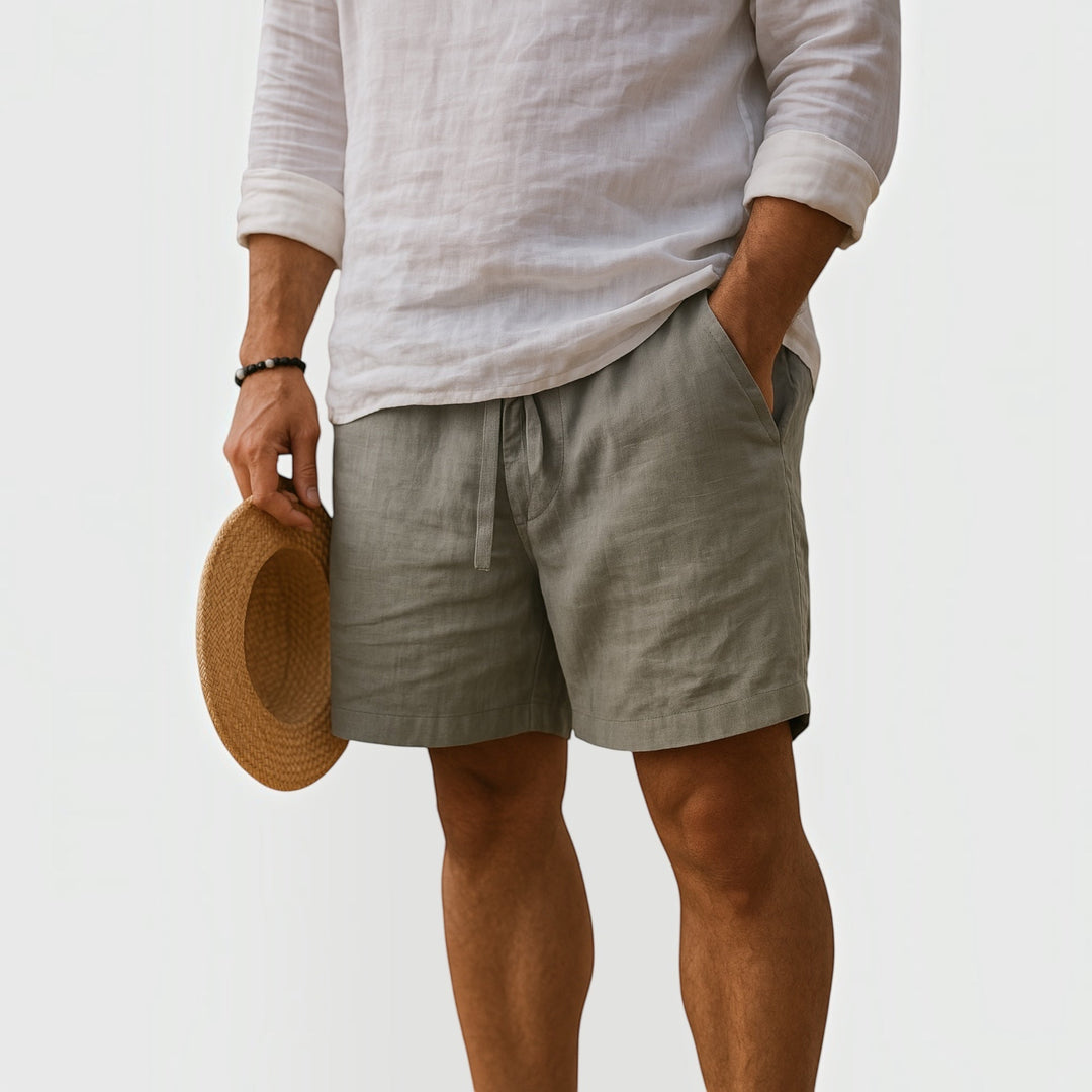 Folded men's lightweight summer shorts, ideal travel apparel for warm weather adventures, ensuring comfort & style.