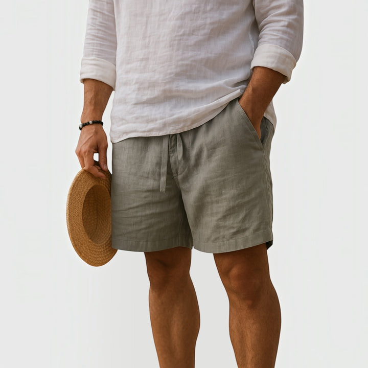 Folded men's lightweight summer shorts, ideal travel apparel for warm weather adventures, ensuring comfort & style.