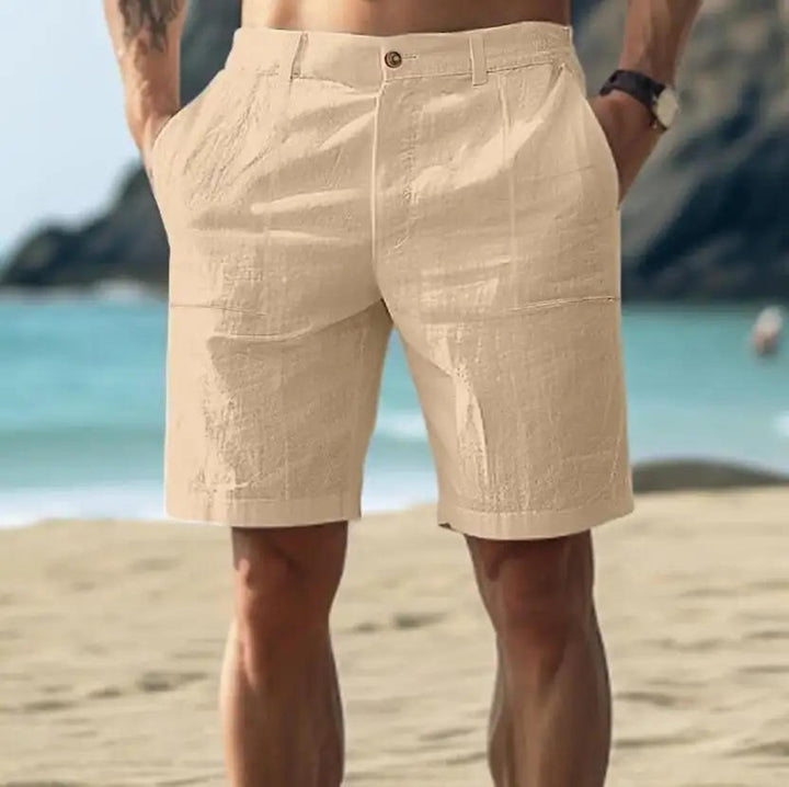 Versatile men's tailored summer shorts with classic pockets, offering comfortable and smart casual warm weather wear.