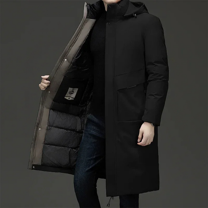 Padded men's hooded long coat. Ideal winter jacket for keeping warm and stylish in cold weather.