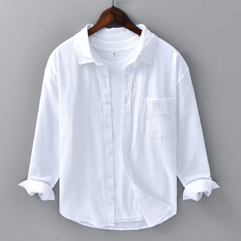 Stylish men's summer button-down shirt, ideal for beachwear or smart casual occasions. Long sleeve, versatile top.