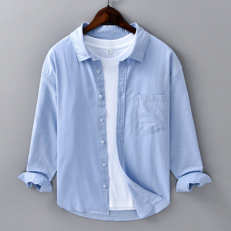 Classic men's long sleeve button-down shirt. Elevate your summer fashion with this comfortable and versatile top.