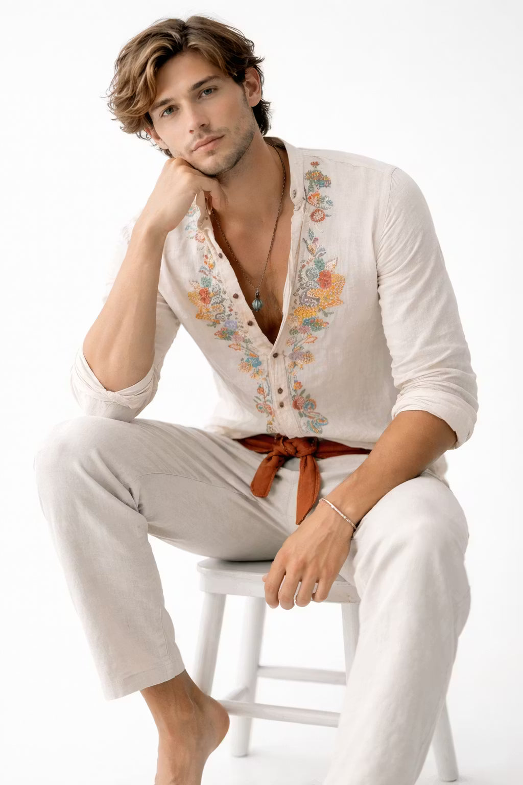 Men's casual long sleeve shirt with unique floral embroidery, offering a comfortable relaxed fit for versatile wear.