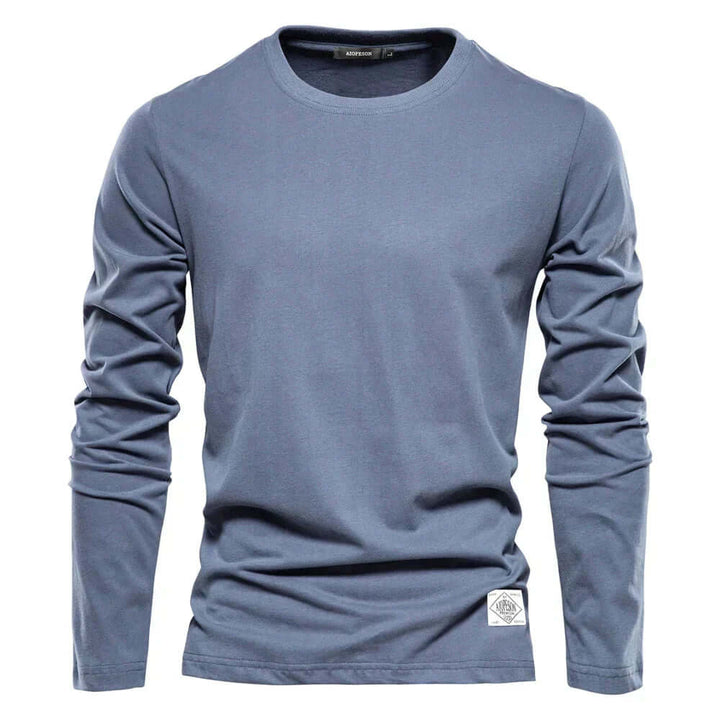 Men's long sleeve crewneck t-shirt, versatile for everyday casual style & comfort.