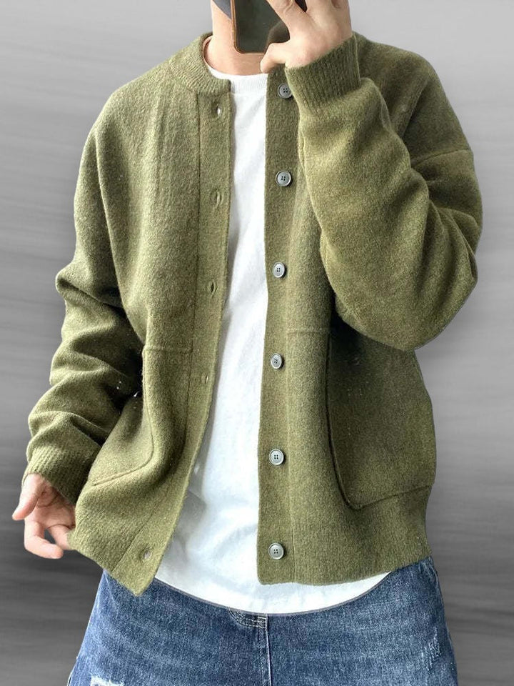 Stylish men's knitted cardigan sweater. Long-sleeve design, perfect for casual layering in cool weather.