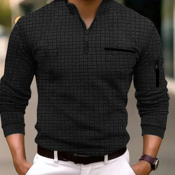 Comfortable men's long sleeve polo shirt. Features a practical zipper pocket for casual wear.